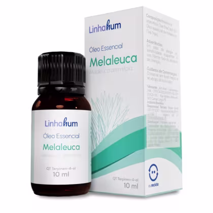 óleo essencial de Melaleuca da marca Linhahum. O rótulo da caixa exibe o nome do produto "Óleo Essencial Melaleuca" e a marca "Linhahum" em destaque.