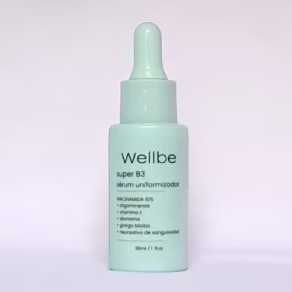 Sérum uniformizador de 30ml da marca Wellbe, chamado "super B3". O rótulo contém informações sobre os principais ingredientes, como niacinamida 10%, oligominerais, vitamina E, alantolna e ginkgo biloba. Proporciona um efeito de uniformização da pele.