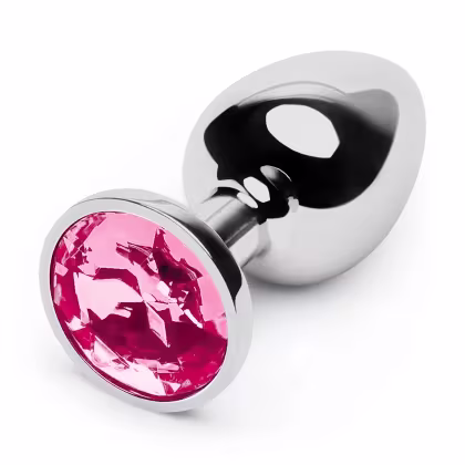 Plug anal de metal com uma gema rosa brilhante incrustada na extremidade. O plug possui um design elegante e minimalista, com uma superfície lisa e brilhante. A gema rosa contrasta com o metal prateado do plug, criando um visual sofisticado e atraente.