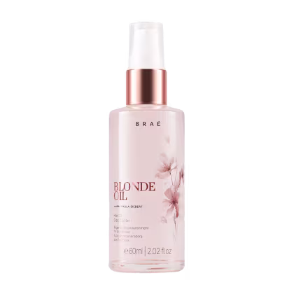 Frasco de óleo capilar Braé Blonde Oil, com embalagem branca e detalhes em rosa dourado, contendo 60ml do produto regenerador e nutritivo para cabelos loiros.