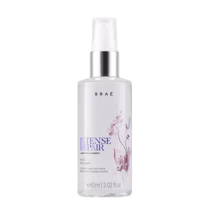 Frasco branco de 60ml com bomba de spray, contendo óleo capilar da marca Braé, com rótulo destacando "Intense Repair" e a assinatura da especialista Ivana Paula Siebert.