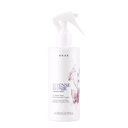 Frasco branco de spray para reparação intensa de cabelos, da marca Braé, com rótulo em tons de roxo e rosa, contendo 260ml do produto.