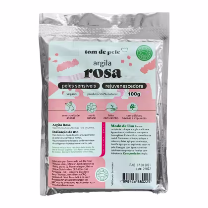 Argila rosa da marca Tom de Pele. A embalagem contém 100g do produto. O rótulo indica que a argila rosa é um produto 100% natural, vegano, sem crueldade animal, rejuvenescedor e indicado para todos os tipos de pele.