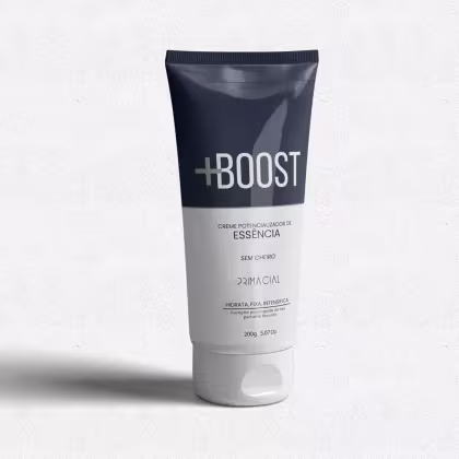 Tubo de creme potencializador de essência da marca Primacial, com embalagem preta e cinza, rotulado como "+BOOST" e indicando ser um produto sem cheiro.