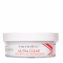 Pó acrílico transparente. A embalagem é um recipiente plástico branco com rótulo vermelho e preto, indicando que se trata de um "Ultra Clear Acrylic Powder". O texto no rótulo também menciona a marca Cuccio Pro.