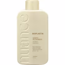 Shampoo pré-tratamento da linha Bioplastia da marca Nuance Professional. A embalagem é um frasco plástico de cor bege clara, com o nome "Bioplastia" e informações sobre o produto impressas no rótulo. O frasco possui um volume de 1000ml.