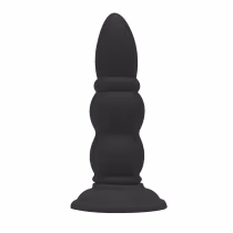 Plug anal em PVC com formato anatômico e base alargada para maior estabilidade. Produto da marca Aine, projetado para proporcionar prazer e estimulação íntima.