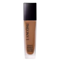 Frasco da base Lancôme Teint Idole Ultra Wear, com o nome da marca e do produto em letras pretas.