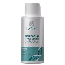 A imagem mostra o Shampoo Inoar Meu Cacho, Meu Crush Solution 500ml, embalagem branca com detalhes em verde. Apresenta descrição indicando que é um shampoo com vitamina B5 que deixa os cabelos macios e hidratados.