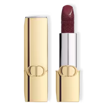 Batom bala com embalagem dourada e logo da Dior.