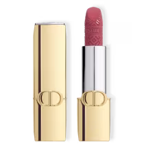 Batom bala com embalagem dourada e logo da Dior.