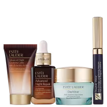 Uma variedade de produtos de cuidados com a pele da marca Estée Lauder. Um gel creme demaquilante, um sérum noturno, um creme de tratamento para pele diurno e uma máscara de cílios.
