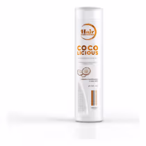 Frasco branco de 300ml da linha Hair Extrattus, com rótulo laranja e texto "Coco licious" destacado. Produto para cabelos, com informações sobre propriedades de hidratação e proteção solar.