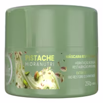 Embalagem de máscara capilar da marca Hair Extrattus, com a cor verde predominante e rótulo destacando o ingrediente "Pistache" e informações sobre hidratação e restauração profunda dos cabelos.