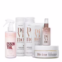 Conjunto de produtos de beleza da marca Braé, incluindo shampoo, condicionador, sérum e máscara para cabelos, em embalagens brancas e rosadas com detalhes em bronze.