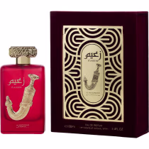 Frasco de perfume vermelho com detalhes dourados em caixa decorativa com padrões geométricos pretos e dourados. O rótulo exibe o nome "Zaeem" e a inscrição "Al Wataniah".
