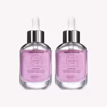 Dois frascos de vidro com soro facial da marca Simple Organic, com rótulo rosa e branco, contendo 30 ml de produto cada, com pipeta aplicadora e tampa preta.