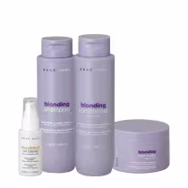 Conjunto de produtos Braé para cabelos loiros, incluindo shampoo, condicionador, máscara e óleo de tratamento, em embalagens de plástico cinza com detalhes em roxo.