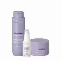Conjunto de produtos Braé Stages Blonding para cabelos loiros, incluindo shampoo, máscara e óleo de tratamento em embalagens de plástico cinza e branco com rótulos indicando suas funções.
