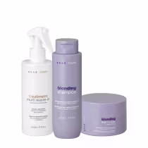 Conjunto de produtos Braé Stages Blonding, incluindo um tratamento multi leave-in, um shampoo e uma máscara para cabelos loiros, em embalagens brancas e roxas com detalhes em dourado.