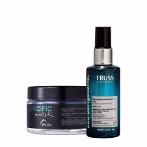 Dois produtos da marca TRUSS: um frasco de óleo reconstrutor e um pote de máscara de hidratação profunda, ambos com embalagens pretas e azuis, exibindo os nomes e descrições dos produtos.