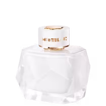 Perfume em frasco de vidro transparente com formato geométrico facetado. O design é minimalista e elegante, característico da marca de luxo Montblanc.