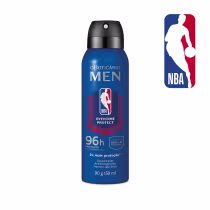 O produto apresentado é um desodorante aerossol da linha NBA Men da marca O Boticário. O frasco é de cor azul com o logo da NBA em vermelho e branco. O texto no frasco indica que se trata de um produto com tecnologia "Shield Control" para maior proteção.
