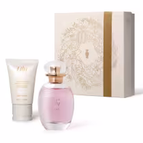 Conjunto de produtos de beleza Lily, contendo um frasco de perfume Eau de Lily Soleil e um creme de mãos Lily em embalagens com detalhes em dourado e branco.