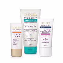 Produtos da linha Neo Dermo da Eudora: protetor solar facial FPS 70, gel de limpeza purificante e creme hidratante antissinais 45+, em embalagens brancas e azuis com detalhes dourados.