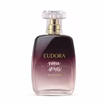 Frasco de perfume Eudora Niina Secrets Nina Bloom, com design elegante em tons de roxo e rótulo em tons de branco e dourado, contendo assinatura Niina Secrets.