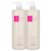 A imagem mostra o shampoo e condicionador Nutri Restore de 1 Litro cada, da marca MAB by Alfaparf Milano. Os frascos cilíndricos são na cor branca, com detalhes em rosa contendo o nome da marca e a indicação para nutrição e restauração.