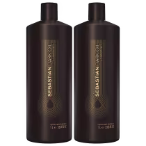 São dois frascos de shampoo leve da marca Sebastian Professional. Os frascos são de plástico marrom escuro e têm formato cilíndrico com tampa preta. Na parte frontal, há o logotipo e nome da marca "Sebastian Dark Oil" em letras douradas.