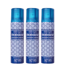 Três frascos de desodorante perfumado Monsieur da marca Greenwood, com embalagem azul e branca, apresentando um padrão geométrico. Cada frasco contém 170 ml do produto.