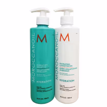 Dois frascos de produtos Moroccanoil: um frasco de shampoo hidratante de cor turquesa e um frasco de condicionador hidratante branco, ambos com bombas pump