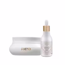 Conjunto de produtos Amend Cosméticos, incluindo um frasco com conta-gotas dourado e uma embalagem branca com detalhes dourados e um padrão decorativo. O rótulo indica tratar-se de um produto de cuidados com a pele.