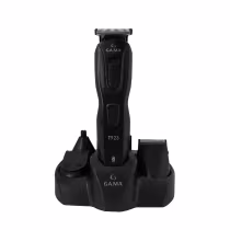 A imagem mostra um aparelho de barbear multifuncional. O aparelho principal tem um design ergonômico na cor preta com uma lâmina de corte aparente na parte superior. Os acessórios são peças pretas destacáveis de diferentes formatos.