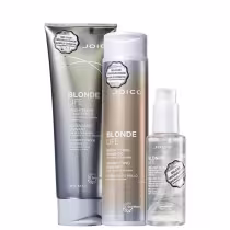 A imagem mostra produtos da linha Blonde Life da marca Joico: shampoo e condicionador com embalagens douradas. Um frasco menor de óleo capilar em embalagem transparente.