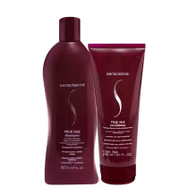 A imagem mostra o shampoo e condicionador em embalagens plásticas na cor vinho, com o logotipo e nome do produto em letras brancas.