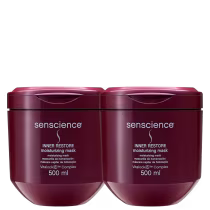 A imagem mostra dois frascos de máscara capilar. Os frascos são de plástico vermelho escuro com tampas da mesma cor. Cada frasco tem capacidade de 500ml.