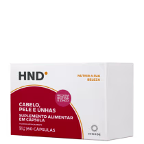 Suplemento alimentar em cápsula da marca Hinode, com embalagem vermelha e branca, para cabelo, pele e unhas, rico em biotina e zinco.