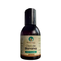 O produto apresentado é um óleo de banana da marca Oleoterapia Brasil. O rótulo indica que o produto é 100% vegetal e possui 100ml de volume.