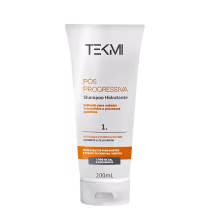 O tubo plástico branco, que contém 200ml. As cores laranja e azul são utilizadas para realçar detalhes, como o nome da linha e os benefícios.
A embalagem transmite uma imagem limpa e moderna, típica de produtos cosméticos profissionais de qualidade.