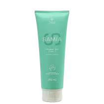Shower Gel 2 em 1 da linha Samia da marca Thera Cosméticos. Embalagem de plástico na cor verde água. Rótulo com o nome do produto "Samia" em letras grandes e o texto "Shower Gel 2 em 1 Cabelo e Corpo" em letras menores.