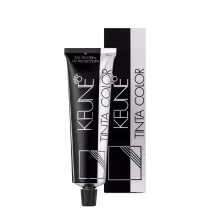 Produto de coloração permanente para cabelos Tinta Color da marca Keune. Embalagem retangular preta com detalhes em branco contendo o nome do produto e da marca.