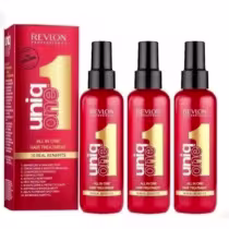 O produto apresentado é um tratamento capilar "All in One" da linha Revlon Professional Uniq One. Consiste em três frascos contendo o tratamento, e uma caixa vermelha que destaca os 10 benefícios reais do produto.