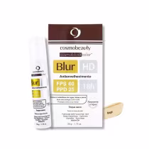 Proteção solar FPS 60 e PPD 25. O produto vem em um tubo branco com o nome "Blur" impresso. O texto na embalagem destaca as propriedades do produto, como o efeito de desfoque, alta proteção UVA e UVB, e resistência à água.