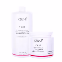 A imagem mostra dois produtos da marca Keune, linha Care Confident Curl. Há um shampoo de 1L e uma máscara de 500ml.