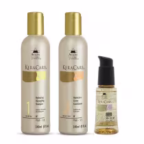 Kit com shampoo desembaraçante, condicionador e finalizador capilar Keracare, da marca Avlon.