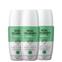 Três frascos de desodorante roll-on da marca Rosa Selvagem, com fragrância de erva-doce. Os frascos possuem embalagem verde e branca, com rótulos indicando proteção e clareamento da pele.