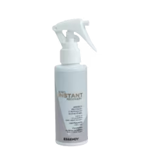 O produto apresentado é um frasco de spray branco da marca Essendy, com o rótulo "Instant Recovery" impresso. O frasco possui um gatilho de pulverização e parece ser um produto de cuidados com a pele ou cabelo, com base no nome e na embalagem.